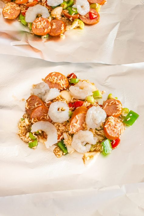 A piece of foil with a scoop of Jambalaya.