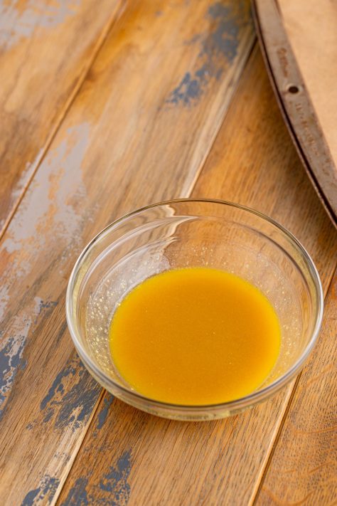 A bowl of sauce.