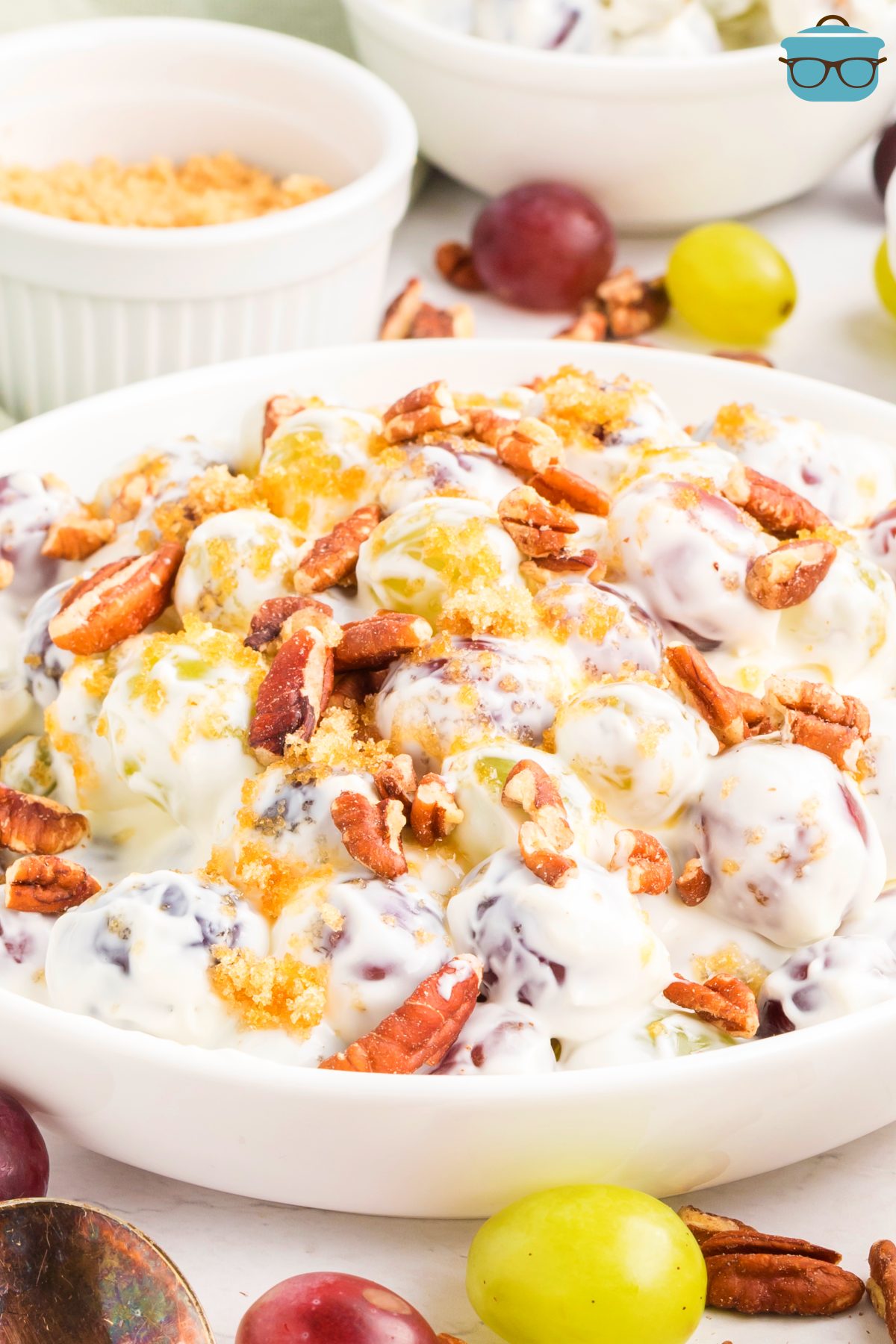 A large serving bowl of Copycat Chicken Salad Chick Grape Salad.