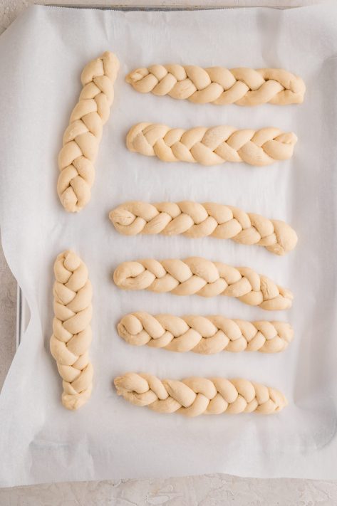 Unbaked, braided bread dough.