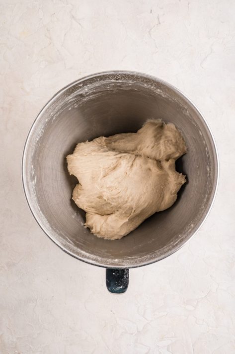 A mixing bowl with bread dough.