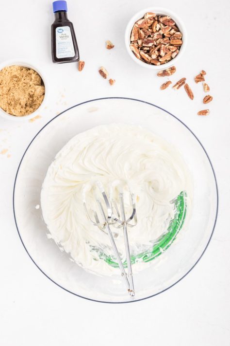 A bowl of whipped cream cheese.