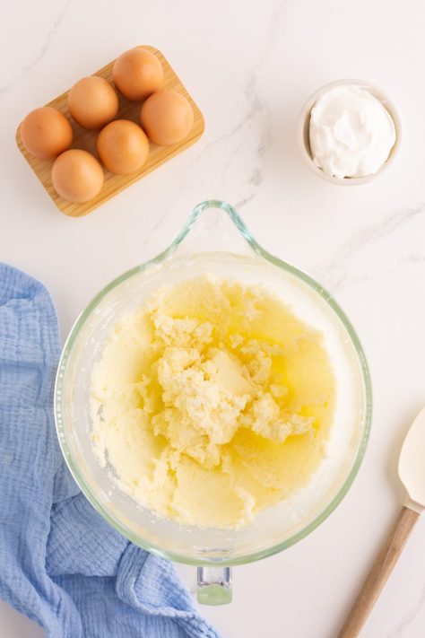 Wet ingredients being creamed together in a bowl.