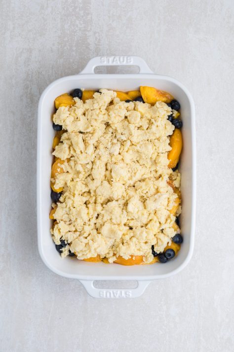 Unbaked Peach Blueberry Cobbler.