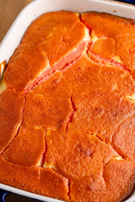 A baked cake in a baking dish.