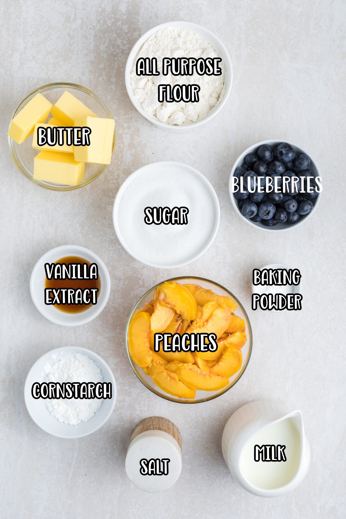Fresh peaches, blueberries, granulated sugar, cornstarch, vanilla extract, all-purpose flour, baking powder, salt, unsalted butter, and milk.