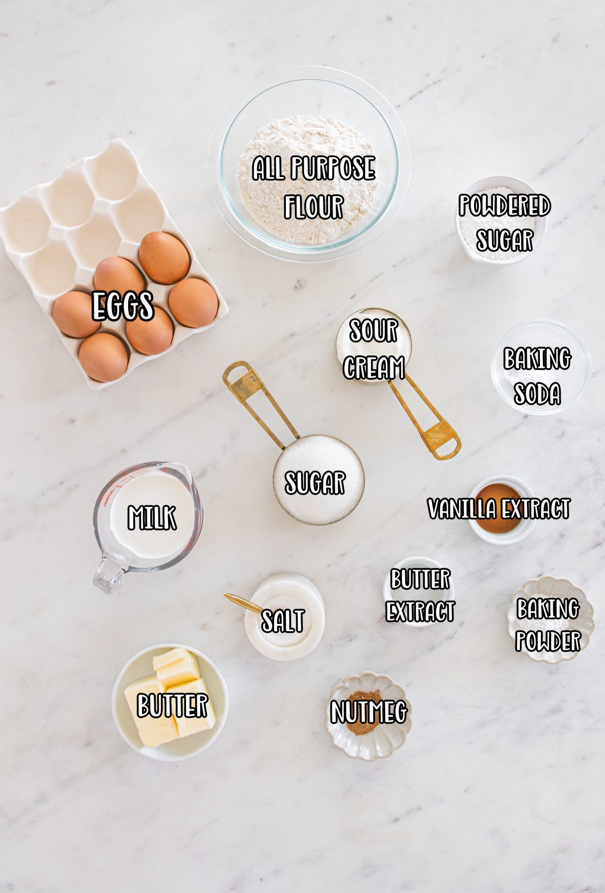 Granulated sugar, eggs, sour cream, whole milk, butter, vanilla extract, butter extract, nutmeg, salt, flour, baking soda, baking powder, melted butter, and powdered sugar.