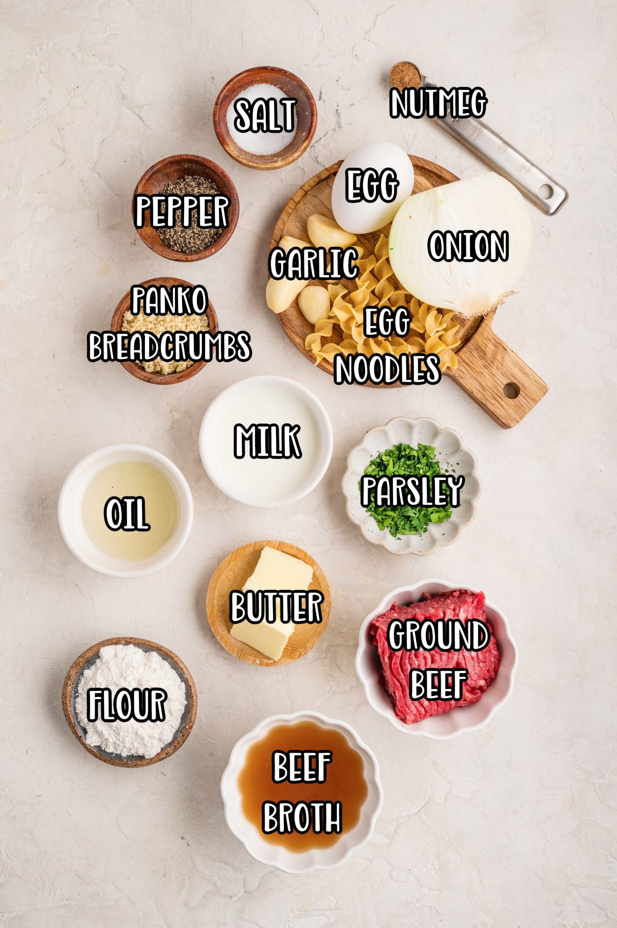 Garlic, parsley, nutmeg, kosher salt, pepper, ground beef, onion, panko breadcrumbs, oil, butter, flour, beef broth, milk, egg noodles, and parsley.