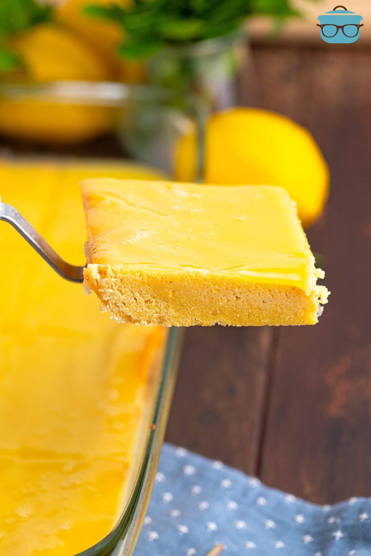 A spatula serving a slice of Lemon Cookie Bar.