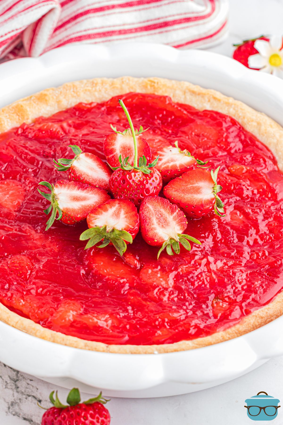 A garnished Strawberry Pie.