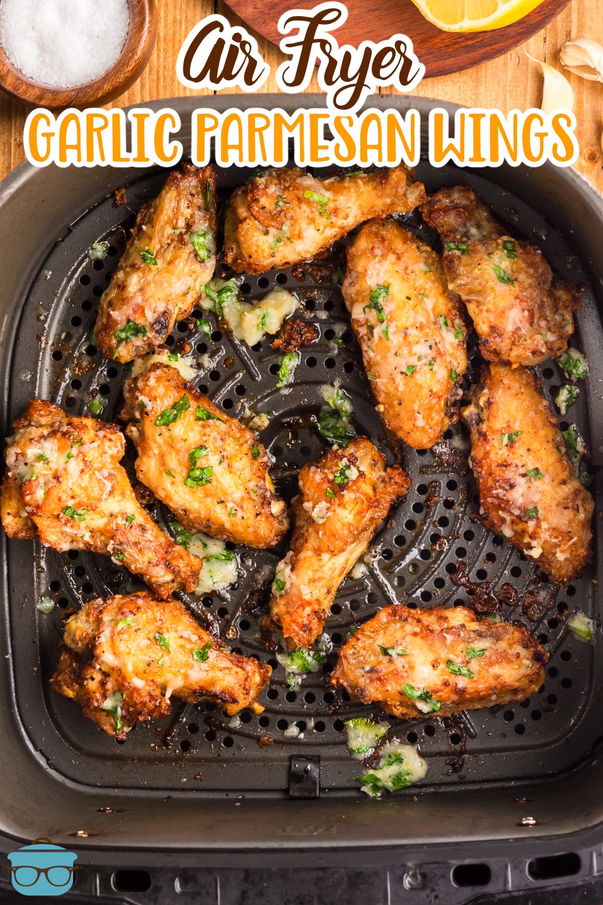 Looking down on a basket of Air Fried Garlic Parmesan Chicken Wings.