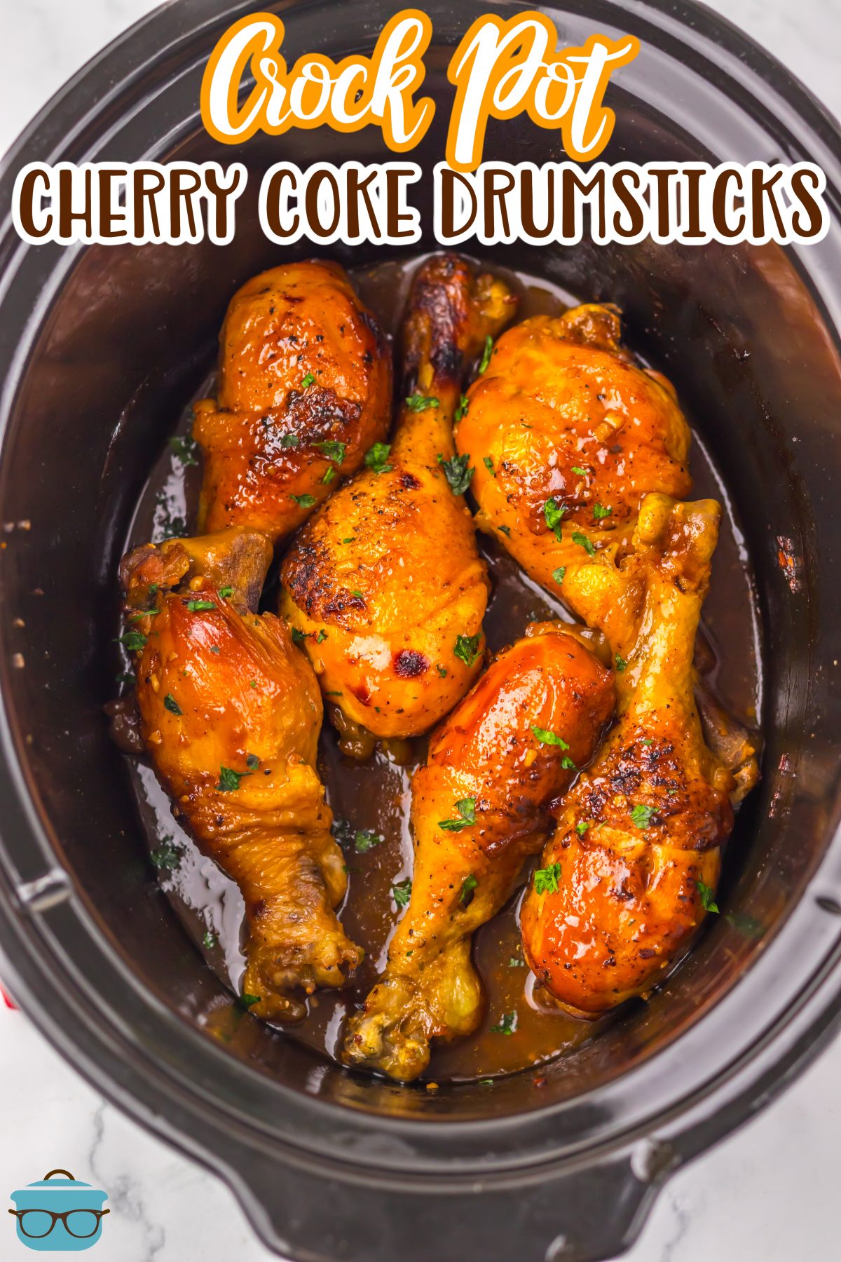 A full Slow Cooker of Cherry Coke Drumsticks.