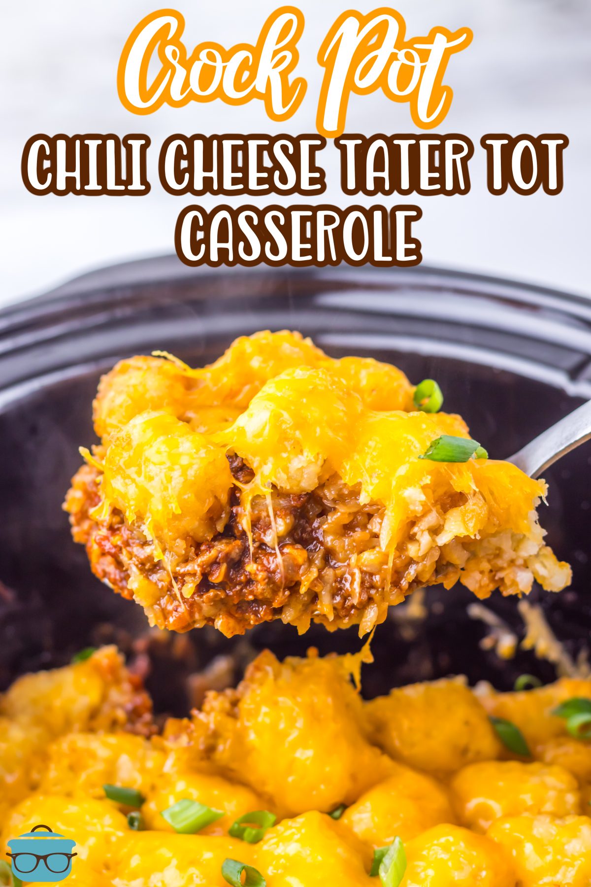 A serving of Chili Cheese Tater Tot Casserole being lifted from the Slow Cooker.