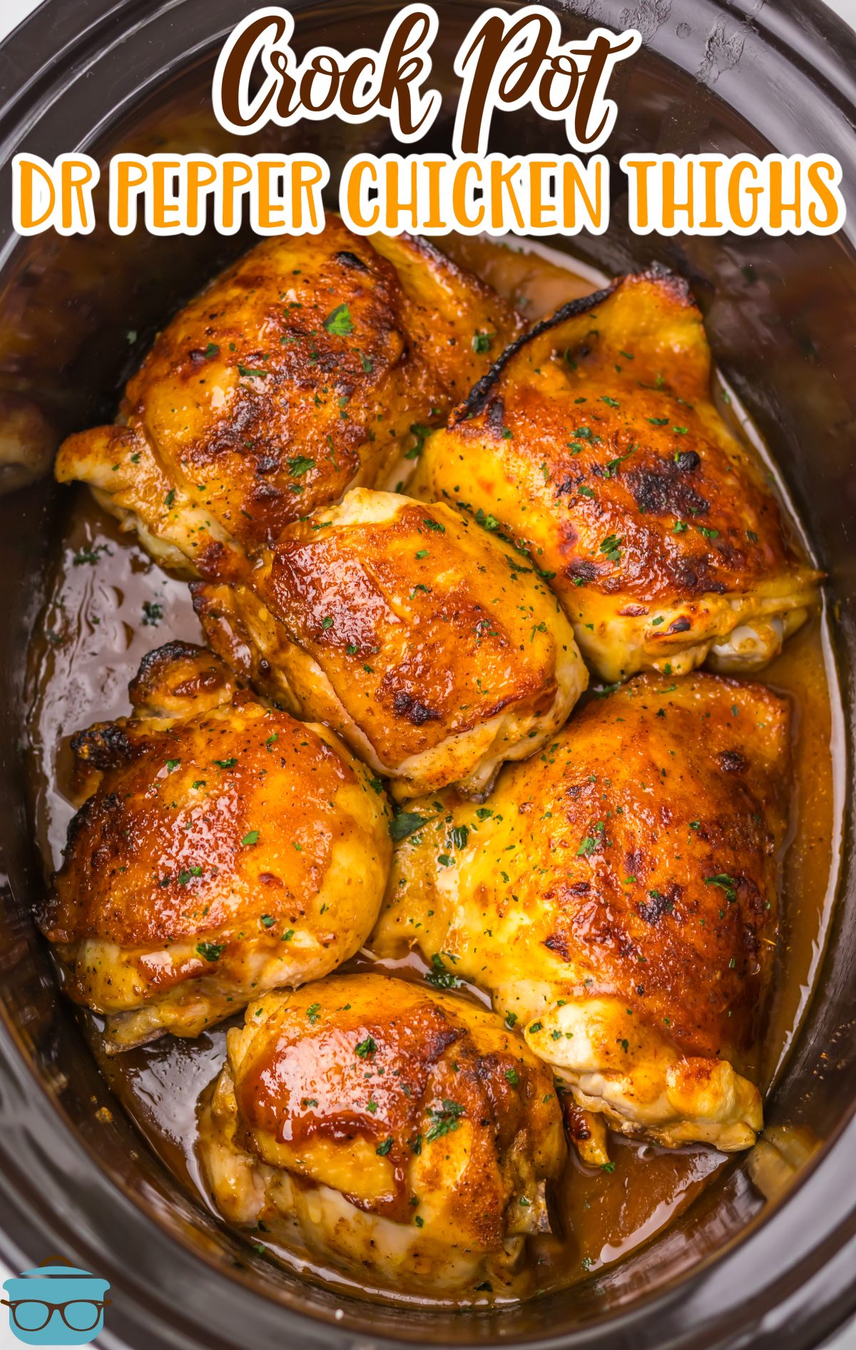 Looking down on a full Crock Pot of Dr Pepper Chicken Thighs. 