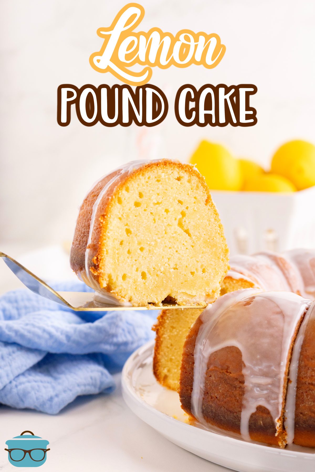 A slice of Lemon Pound Cake being removed from the cake plate and the rest of the cake.