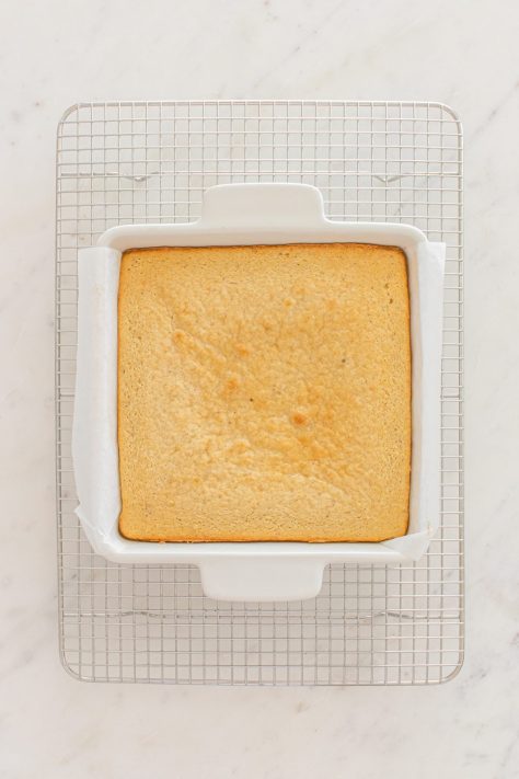A baked cake in a baking dish.