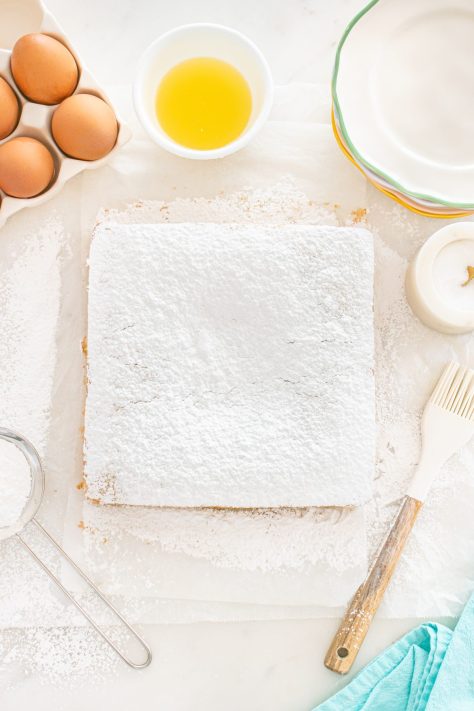 A powdered sugar coated cake.