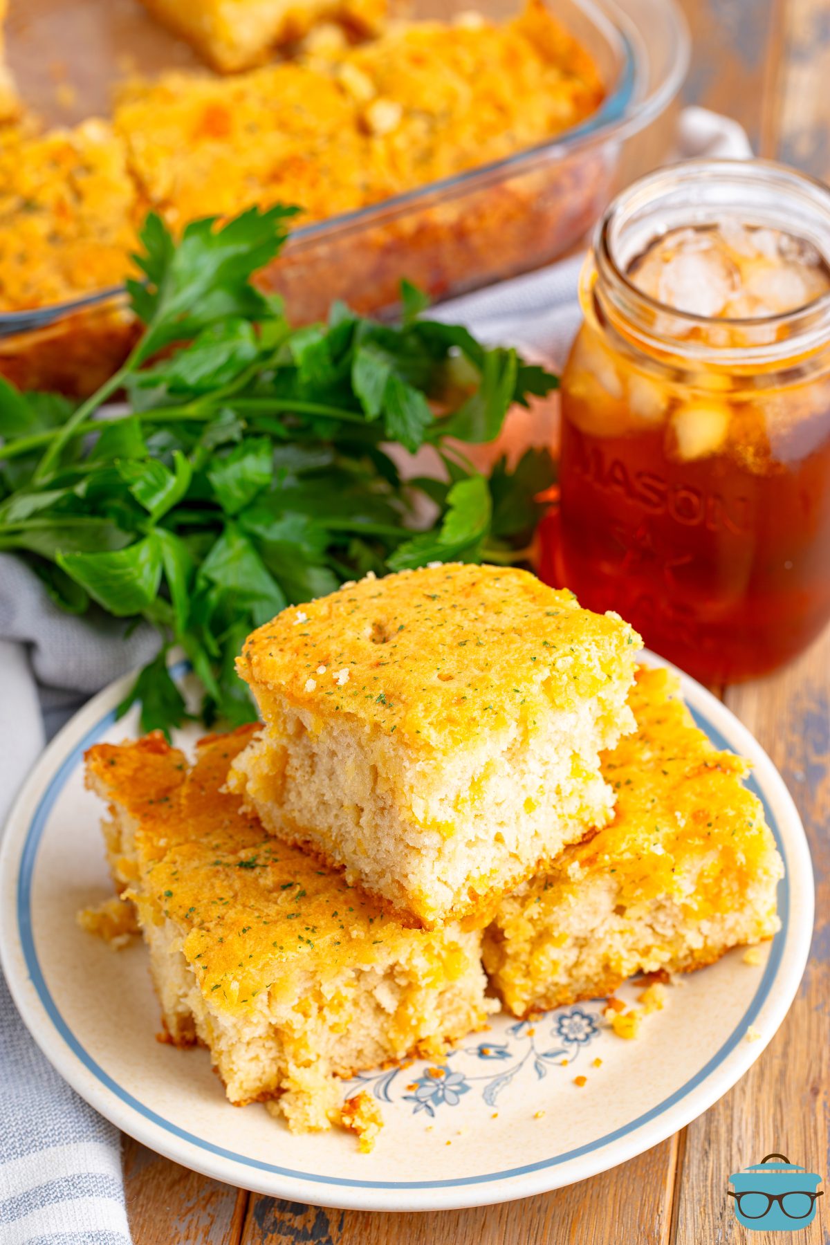 A small plate with a few Cheddar Bay Butter Swim Biscuits.