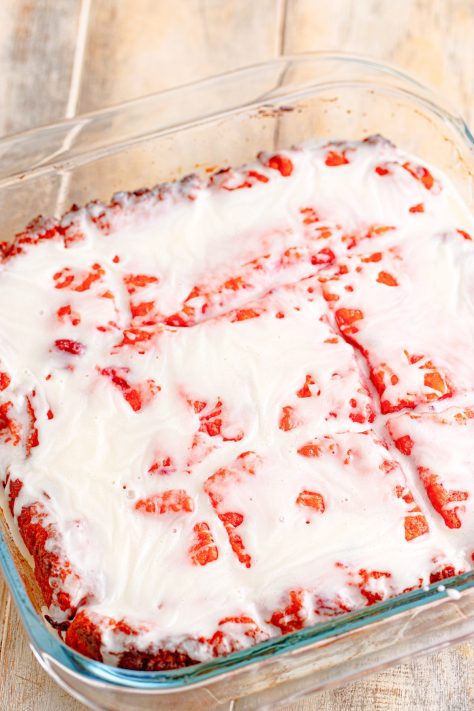 Glazed Cherry Butter Swim Biscuits in a baking dish.