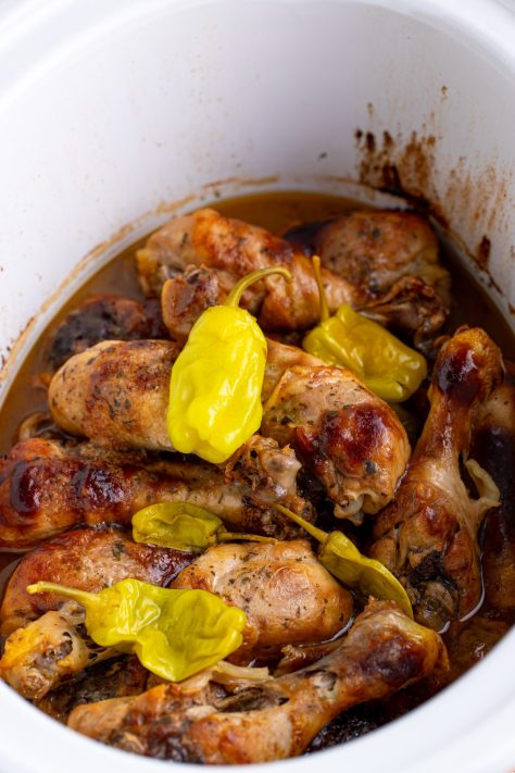 Cooked Mississippi Chicken Legs in a Crock Pot.
