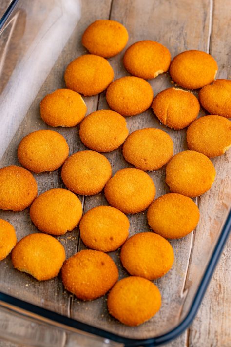 A layer of Nilla wafers in a baking dish.