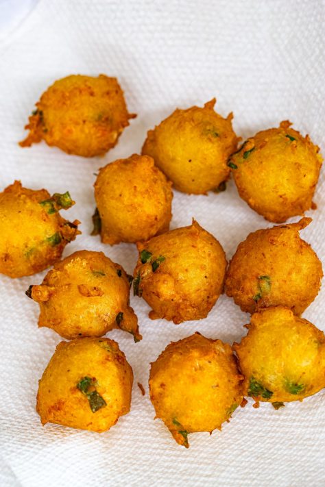 Shrimp Fritters draining on paper towels.