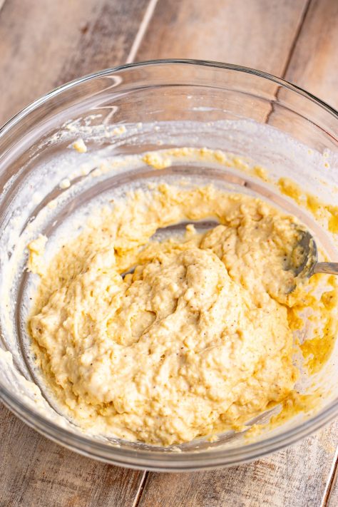 A batter in a bowl being mixed.