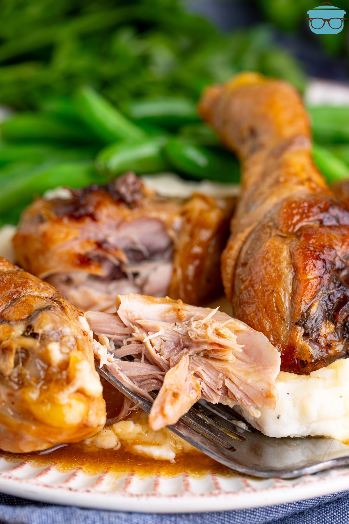 A partial eaten Mississippi Chicken Leg with a few behind it.