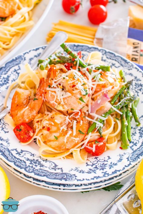 A plate with a serving of Sheet Pan Shrimp Scampi.