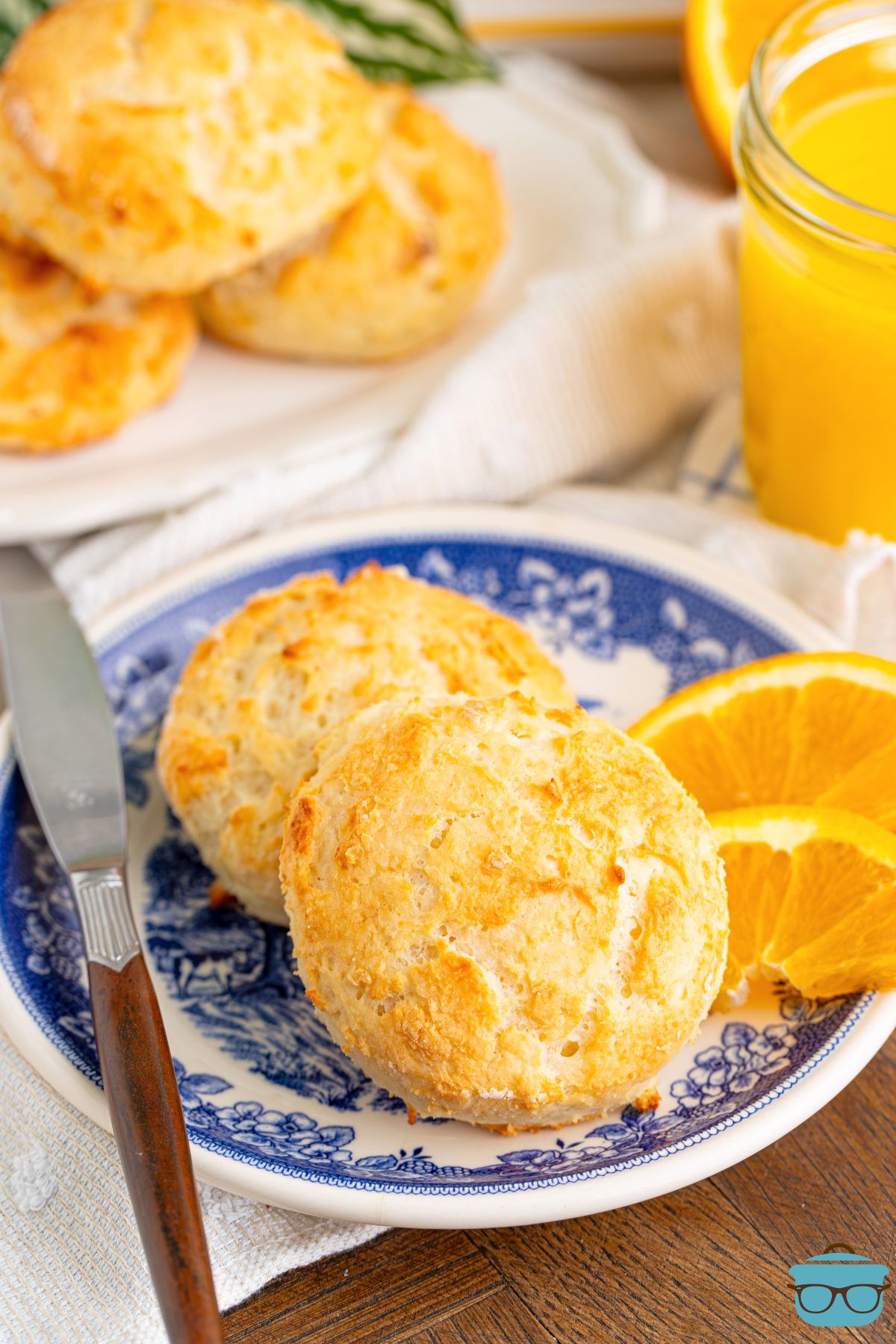 A few Two Things Biscuits on a plate and in a small paper towel.