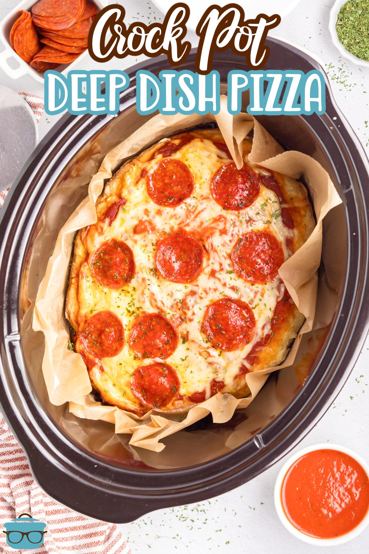 A lined Slow Cooker with a Crock Pot Deep Dish Pizza with pepperonis.