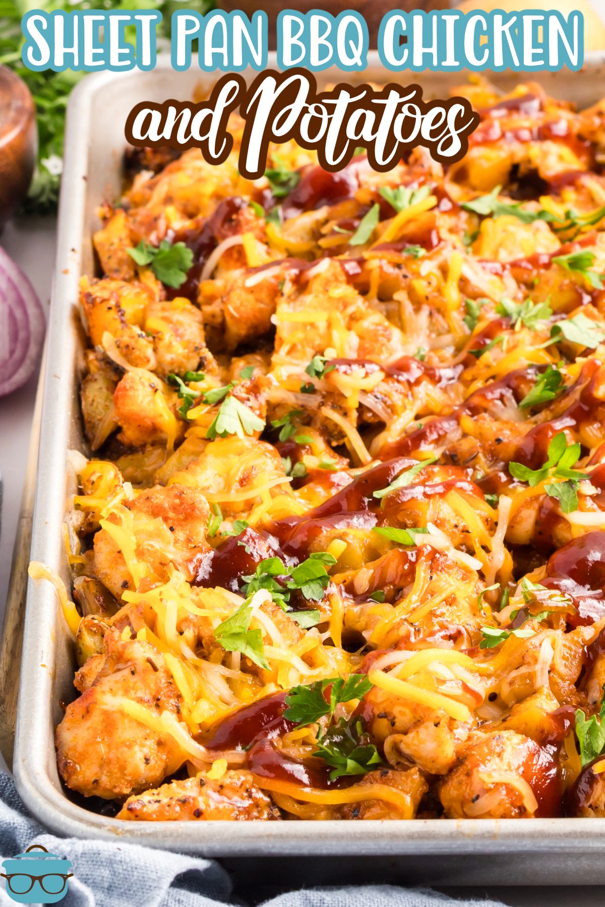 Sheet Pan BBQ Chicken and Potatoes on a baking sheet.